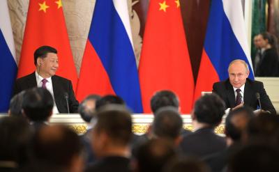 Vladimir_Putin_and_Xi_Jinping_%282019-06-05%29_44.jpg